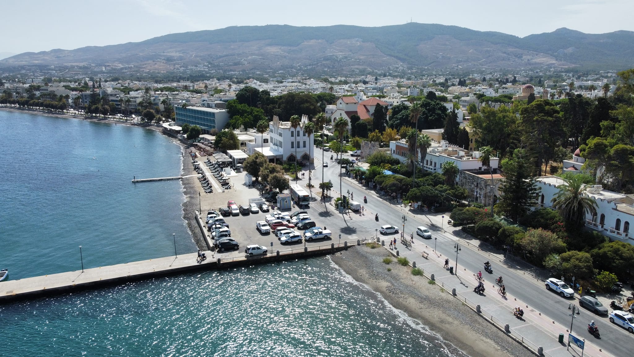 Kos Island: Essential Information, Emergency Contacts, and Quick Facts Kos is a picturesque Greek island located in the southeastern Aegean Sea. Known for its stunning beaches, rich historical sites, and warm Mediterranean climate, Kos attracts thousands of visitors annually. Here’s a guide to help you stay informed and safe on the island. Quick Facts About Kos Island Location: Southeast Aegean Sea, part of the Dodecanese Islands, Greece. Population: Approximately 34,000 residents. Language: Greek (English widely spoken in tourist areas). Currency: Euro (€). Time Zone: Eastern European Time (EET), UTC +2. (UTC +3 during Daylight Saving Time) Climate: Mediterranean, with hot, dry summers and mild, wet winters. Main Attractions: Asklepion: Ancient healing center dedicated to Asclepius, the god of medicine. Kos Town: The island’s capital, featuring historical sites such as the Neratzia Castle and Roman Odeon. Therma Beach: Famous for its natural hot springs. Hippocrates’ Plane Tree: Where Hippocrates, the father of medicine, is said to have taught his students. Useful Information for Visitors Getting Around Public Transport: Kos has a reliable bus system connecting major towns and tourist areas. The main bus station is in Kos Town. Car & Scooter Rentals: Popular on the island for reaching more remote areas. Valid EU or international driving licenses are required. Biking: Kos is very bike-friendly, especially around Kos Town and the coast, with dedicated bike lanes and rental shops available. Taxis: Readily available but can be more expensive than other options. Health and Safety Tips Health Care: Kos has a public hospital in Kos Town and several private clinics and pharmacies around the island. Water Quality: Tap water is generally safe to drink in Greece, but many locals and tourists prefer bottled water. Sun Protection: The Mediterranean sun can be intense, so bring sunscreen, hats, and sunglasses. Drink plenty of water, especially in summer. Seismic Activity: Kos is in a region with occasional seismic activity. Earthquakes are rare but possible, so familiarize yourself with safety protocols. Emergency Contacts for Kos Island Police (Astynomia): 100 or (+30) 22420 22222 (Kos Town Police Station) Fire Department (Pyrkagogiki): 199 or (+30) 22420 22199 Ambulance Service (EKAV): 166 General Hospital of Kos: (+30) 22420 23231 (Located in Kos Town) European Emergency Number: 112 (can be dialed for all emergencies, including police, ambulance, and fire) Additional Contact Numbers Tourist Police: (+30) 22420 23333 (Assists with issues specific to tourists, such as lost documents or accommodations) Port Authority (Kos Harbor): (+30) 22420 26594 Lost and Found (at Kos Airport): (+30) 22420 56000 Pharmacy On-Duty: (+30) 22420 28620 (Call to find the nearest open pharmacy during nights, weekends, or holidays) Staying Connected SIM Cards & WiFi: Local SIM cards (Cosmote, Vodafone, Wind) are available for tourists. Many hotels, cafes, and restaurants offer free WiFi. Electricity: Standard European sockets (Type C and F) at 230V. An adapter may be needed for non-European devices. Unique Island Events & Festivals Hippocratia Festival: Celebrated in honor of Hippocrates with concerts, theater performances, and exhibitions. Religious Feasts: Celebrations for local saints, often involving food, music, and dancing. Key dates include August 15 (Assumption of Mary). Final Travel Tips Language Tips: Learning a few Greek phrases, like "kalimera" (good morning) and "efharisto" (thank you), can be helpful and appreciated by locals. Beach Etiquette: Many beaches are family-friendly, but there are also some nudist-friendly areas. Peak Season: Kos can be very busy in July and August. For a quieter experience, consider visiting in May, June, or September. Kos offers a harmonious blend of natural beauty, cultural richness, and historical intrigue, making it a destination worth exploring in-depth. With this guide, you'll have quick access to the information you need to make the most of your stay and ensure a safe and enjoyable experience.